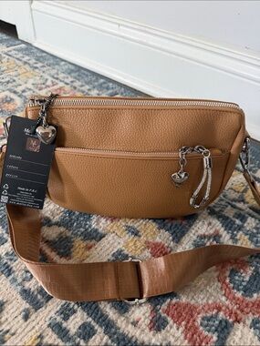 Brand New Tan Crossbody purse Bag very spacious pockets with Heart Charm